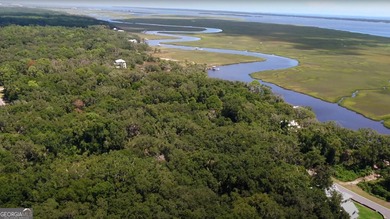 Beautiful marsh front lot with a spectacular sunrise over - photo 12
