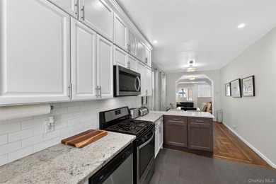 Turn-Key Perfection in the Heart of Pelham Bay! Welcome home to - photo 17