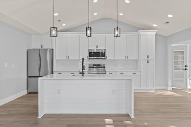 Welcome to this beautifully fully renovated 3 bedrooms, 2 and a - photo 29