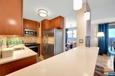 Beautifully appointed, this west facing, high floor large one