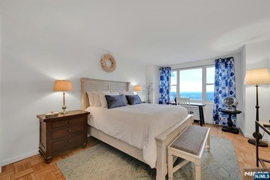 Beautifully appointed, this west facing, high floor large one