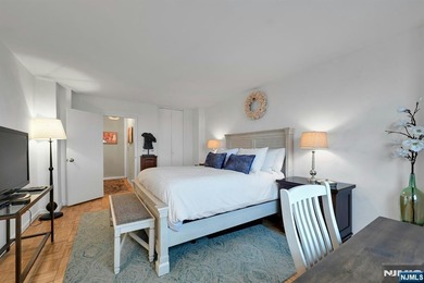 Beautifully appointed, this west facing, high floor large one