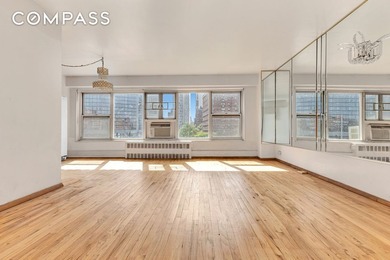 Enter through a warm and welcoming foyer into a generous living - photo 2