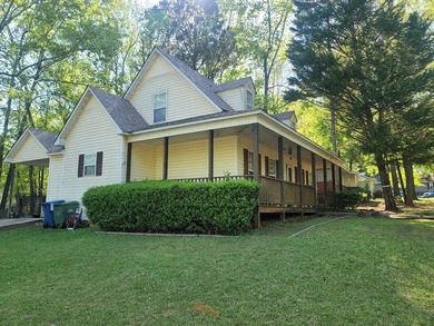 Back on the market and even better! Welcome home to this warm - photo 3