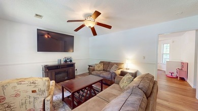 Back on the market and even better! Welcome home to this warm - photo 6