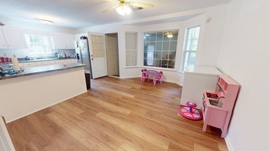 Back on the market and even better! Welcome home to this warm - photo 9
