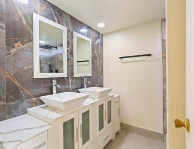 Welcome to this updated 2BR/2.5BA townhouse in the Village of - photo 11