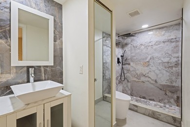 Welcome to this updated 2BR/2.5BA townhouse in the Village of - photo 12