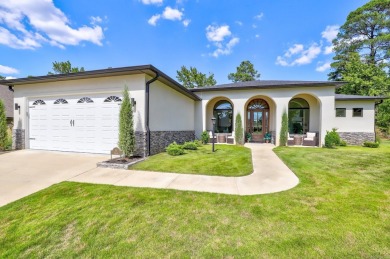 Welcome to this stunning stone and stucco Mediterranean-style