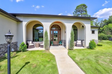 Welcome to this stunning stone and stucco Mediterranean-style