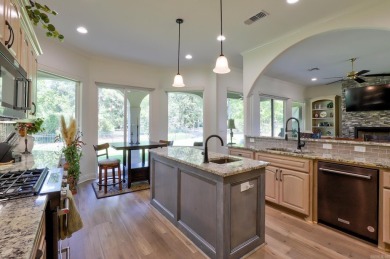 Welcome to this stunning stone and stucco Mediterranean-style