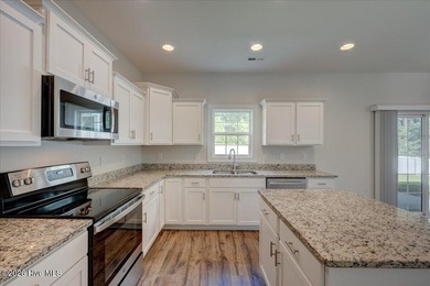 Move-in-ready 4 bedroom, 2.5 bath home perfectly tucked in the - photo 18
