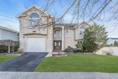 Welcome to this beautiful Colonial-style home located in the - photo 1
