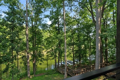 Experience lake living at its finest in this custom-built - photo 13