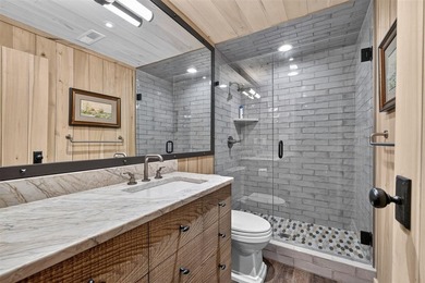 Experience lake living at its finest in this custom-built - photo 15
