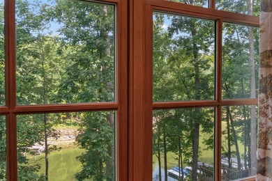 Experience lake living at its finest in this custom-built - photo 35