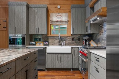Experience lake living at its finest in this custom-built - photo 42