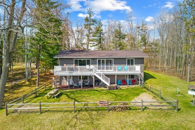 Lake Home For Sale in Atlanta, Michigan