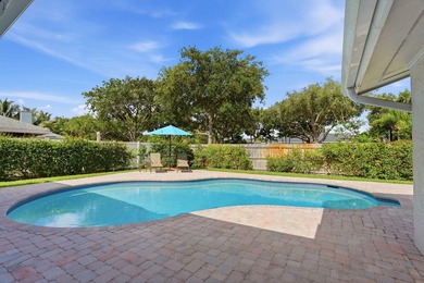 Welcome to this beautifully updated one-story pool home in - photo 3
