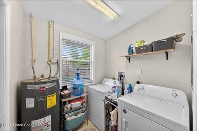 This charming mid-century, 3-bedroom home sits proudly on a - photo 24