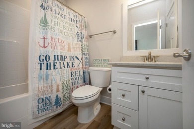 Welcome to 107 Plantation Dr, a lakeside retreat thoughtfully - photo 46