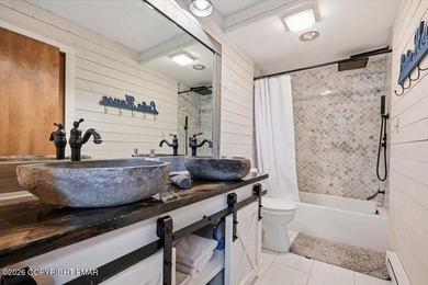Welcome to this beautifully renovated townhome in the highly - photo 2