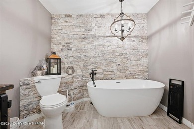 Welcome to this beautifully renovated townhome in the highly - photo 3