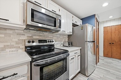 Welcome to this beautifully renovated townhome in the highly - photo 7