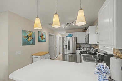 Fully furnished and turnkey, this beautifully maintained coastal - photo 14