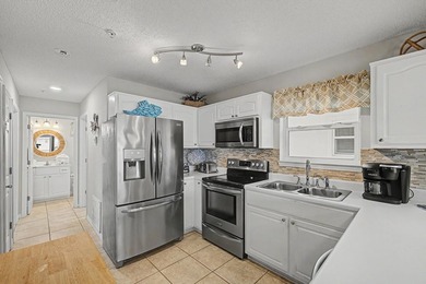 Fully furnished and turnkey, this beautifully maintained coastal - photo 15
