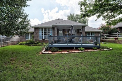 Nestled within a gated community offering a neighborhood pond - photo 3