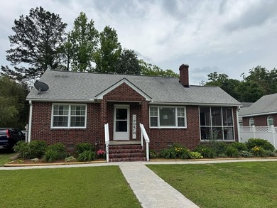 This 3-bedroom 1-bath home with spacious rooms and a unique - photo 1