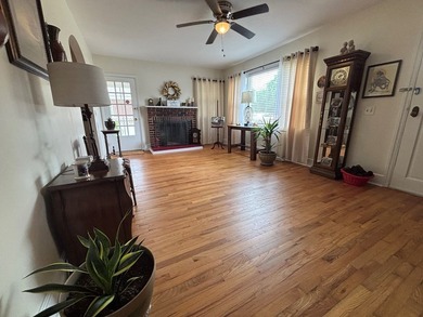 This 3-bedroom 1-bath home with spacious rooms and a unique - photo 3