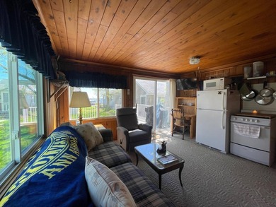 Nestled on the picturesque west shore of Houghton Lake, the - photo 4