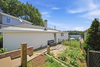 Wake up to sweeping views of Pine Island Pond from this charming - photo 21