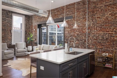 Perfectly positioned in the heart of downtown, this exceptional