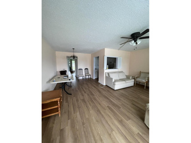 Enjoy active adult living in this desirable 1/1.5 waterfront - photo 1