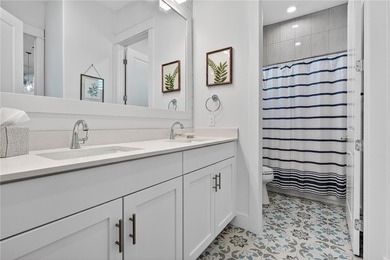 Experience elevated coastal living in this stunning three-level - photo 19