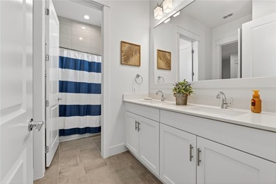 Experience elevated coastal living in this stunning three-level - photo 22