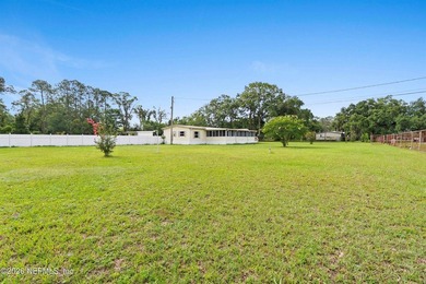Rare opportunity to own 1.86 fully fenced acres in Jacksonville! - photo 13