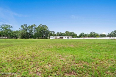Rare opportunity to own 1.86 fully fenced acres in Jacksonville! - photo 14