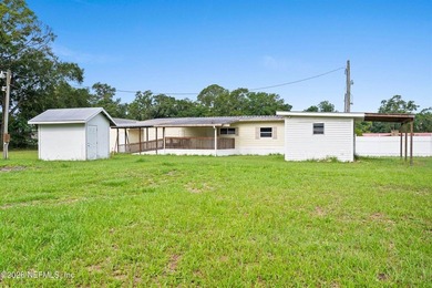 Rare opportunity to own 1.86 fully fenced acres in Jacksonville! - photo 16