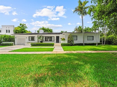 Nestled in one of Coral Gables' most prestigious and - photo 1
