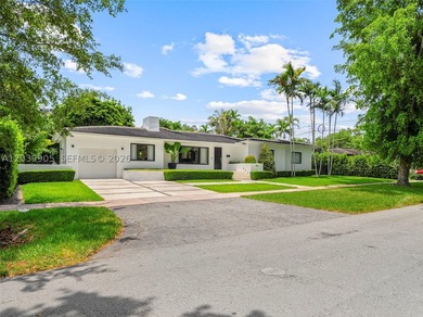 Nestled in one of Coral Gables' most prestigious and - photo 3