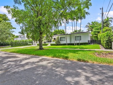 Nestled in one of Coral Gables' most prestigious and - photo 6