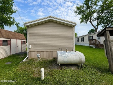 Affordable living in a well-maintained community! This 3-bedroom - photo 11
