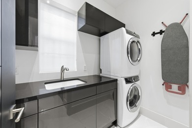 Built in 2020, this chic in-town home on the ocean block of