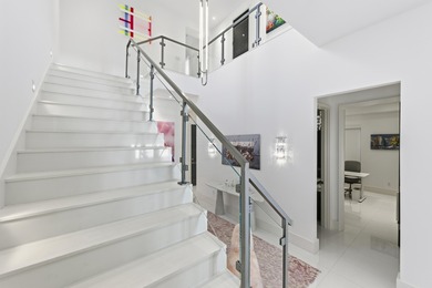 Built in 2020, this chic in-town home on the ocean block of