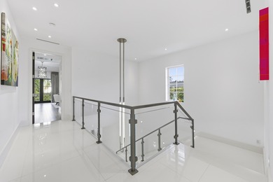 Built in 2020, this chic in-town home on the ocean block of