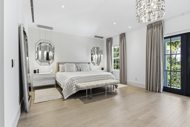 Built in 2020, this chic in-town home on the ocean block of